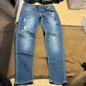 Distressed Blue Jeans
